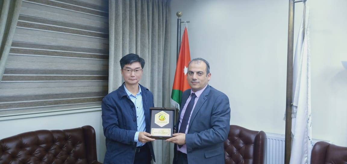 وفد من معهد بحوث الغاز الحيوي الصيني يزور الوطني للبحوث الزراعية 