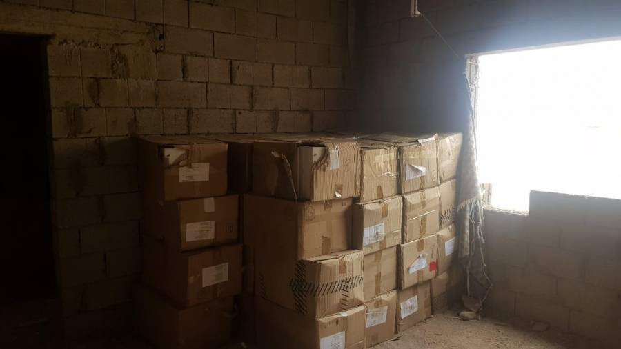 الجمارك الأردنية تداهم مستودعاً يحتوي بضائع مهربة في العقبة