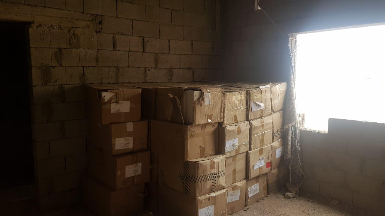 الجمارك الأردنية تداهم مستودعاً يحتوي بضائع مهربة في العقبة