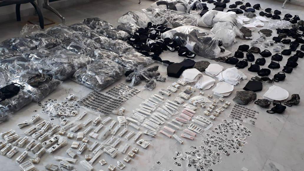 ضبط معملين يصنعان معقمات مقلدة في العاصمة والرصيفة ومشغل يصنع كمامات مقلدة بالرصيفة 