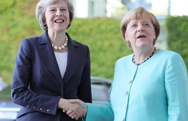 ترامب نعت ميركل بـ الغبية .. ووصف تريزا ماي بالحمقاء