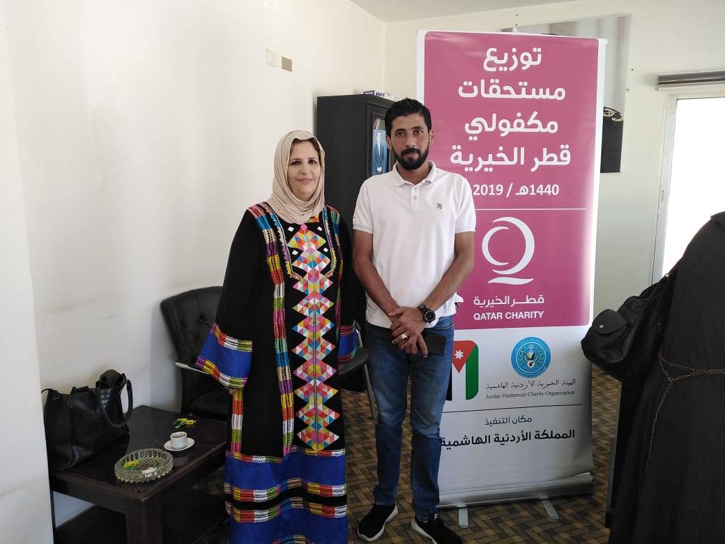 الهيئة الخيرية الهاشمية والجمعية القطرية تسلم كفالات الايتام في مادبا 