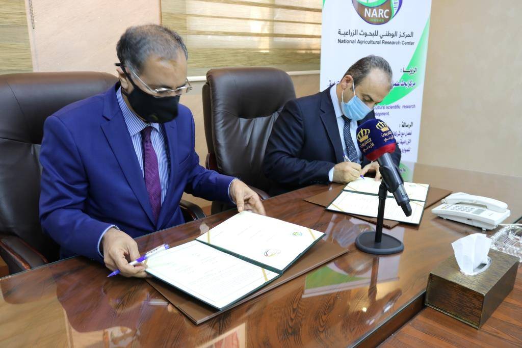 مذكرة تفاهم بين دائرة تنمية اموال الاوقاف والمركز الوطني للبحوث الزراعية