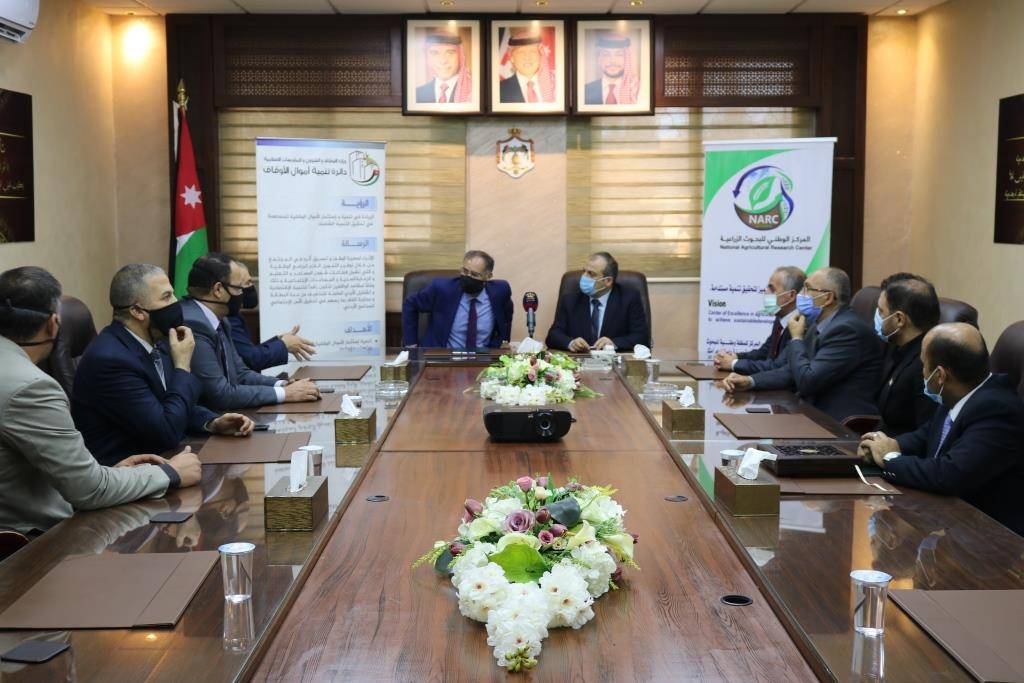 مذكرة تفاهم بين دائرة تنمية اموال الاوقاف والمركز الوطني للبحوث الزراعية