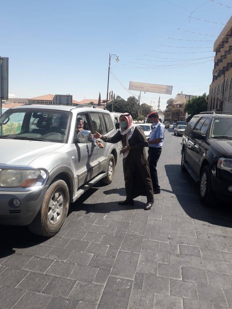 الشرطة المجتمعية في مادبا تشارك بمبادرة الطريق الآمن