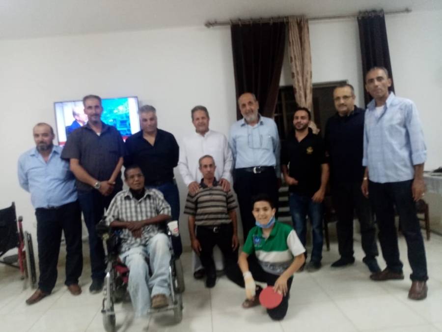 نادي الوحدة الرياضي بمادبا يزور نادي الاعاقة الحركية مادبا ويقرأ الفاتحة على روح المرحوم هاني السعيدات
