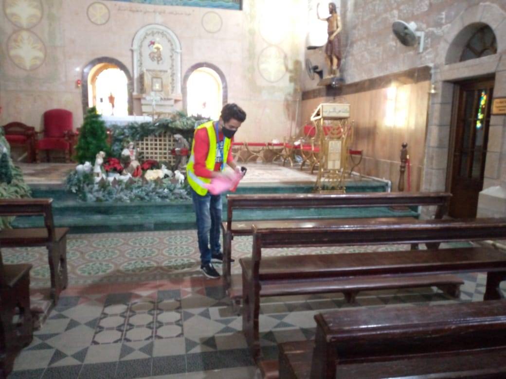 مادبا .. كلنا الاردن تنفذ حملة تطوعية لتعقيم الكنائس