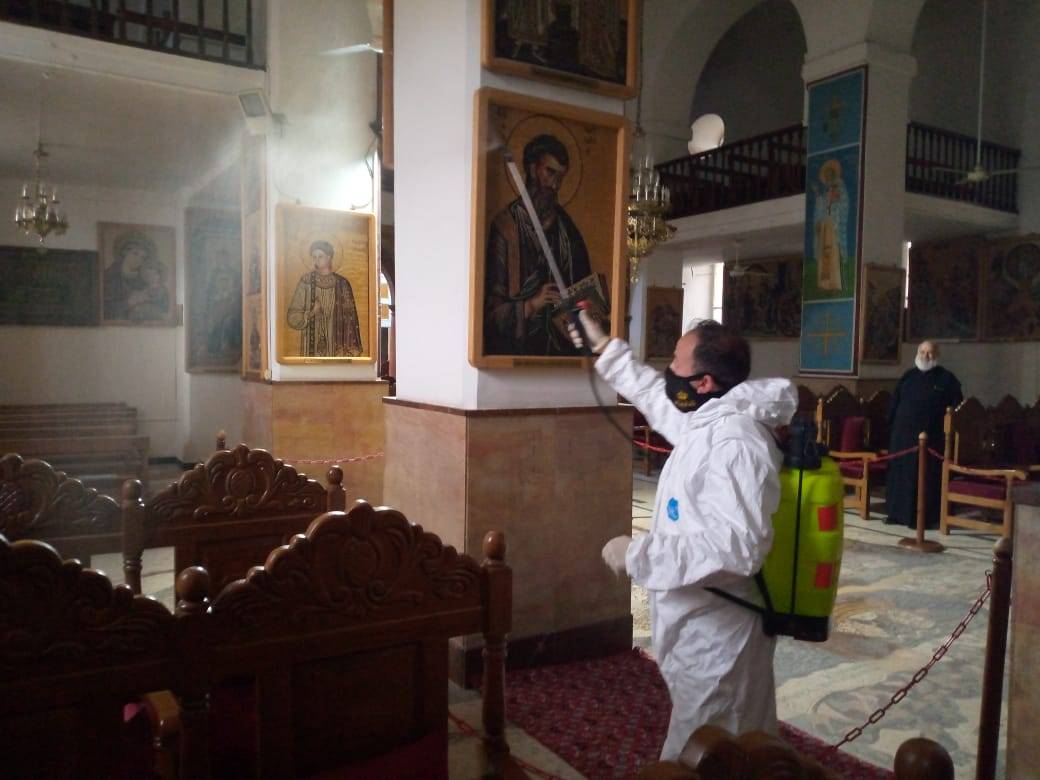 هيئة شباب كلنا الاردن وفريق راجم يواصلان تعقيم الكنائس في مادبا