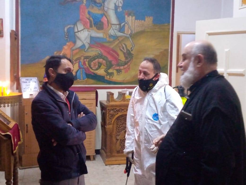 هيئة شباب كلنا الاردن وفريق راجم يواصلان تعقيم الكنائس في مادبا