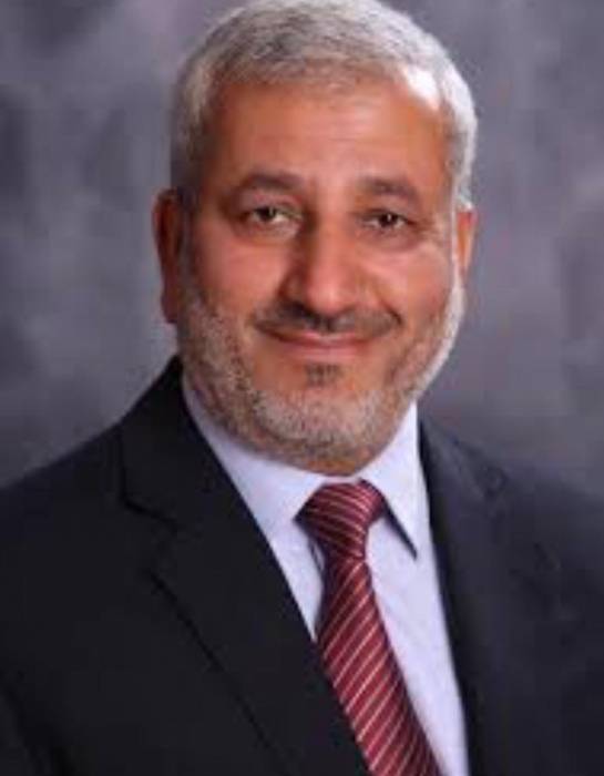 الدكتور حسين قطيشات يهنئ الدكتور مروان شحادة بحصوله على الدكتوراة في الصحافة