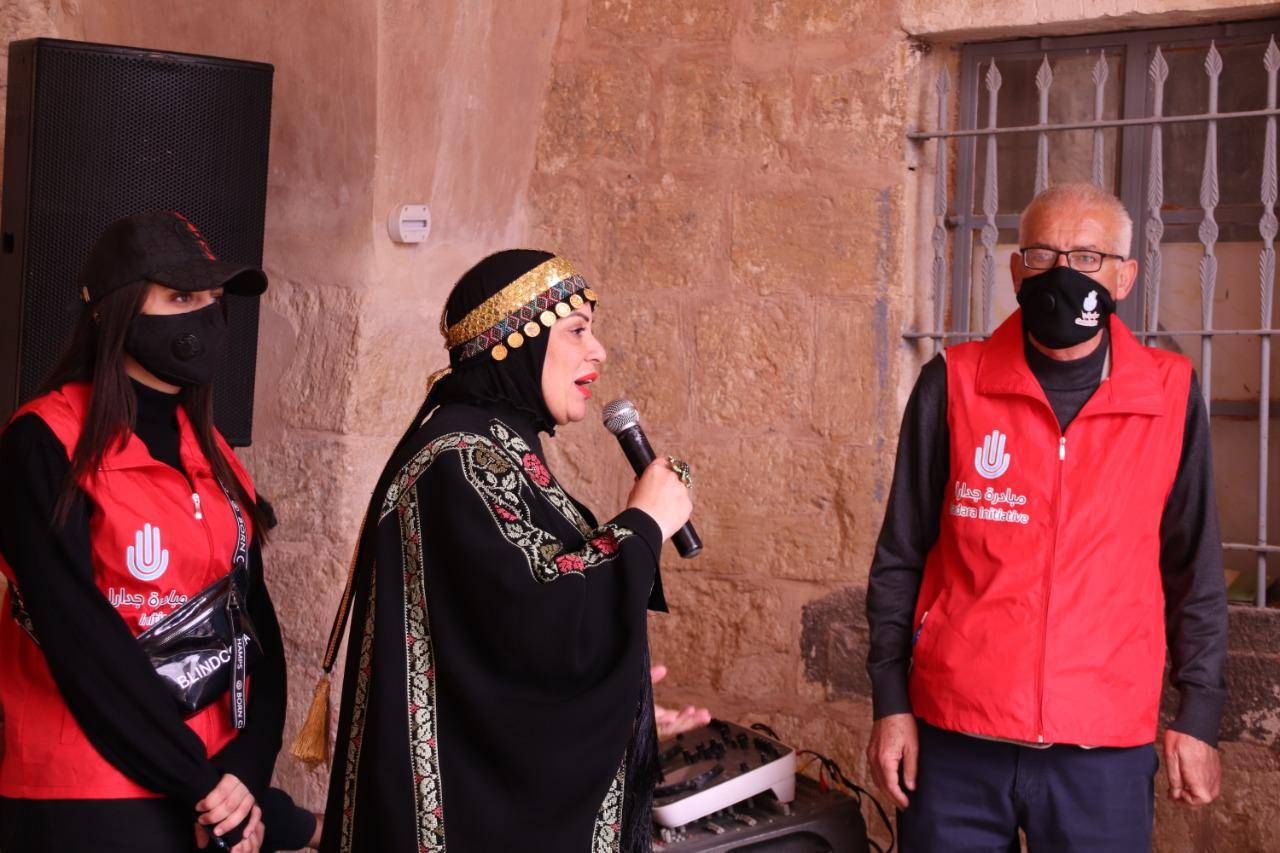 ذوي متلازمة داون يحتفلون بذكرى مئوية الدولة الأردنية 