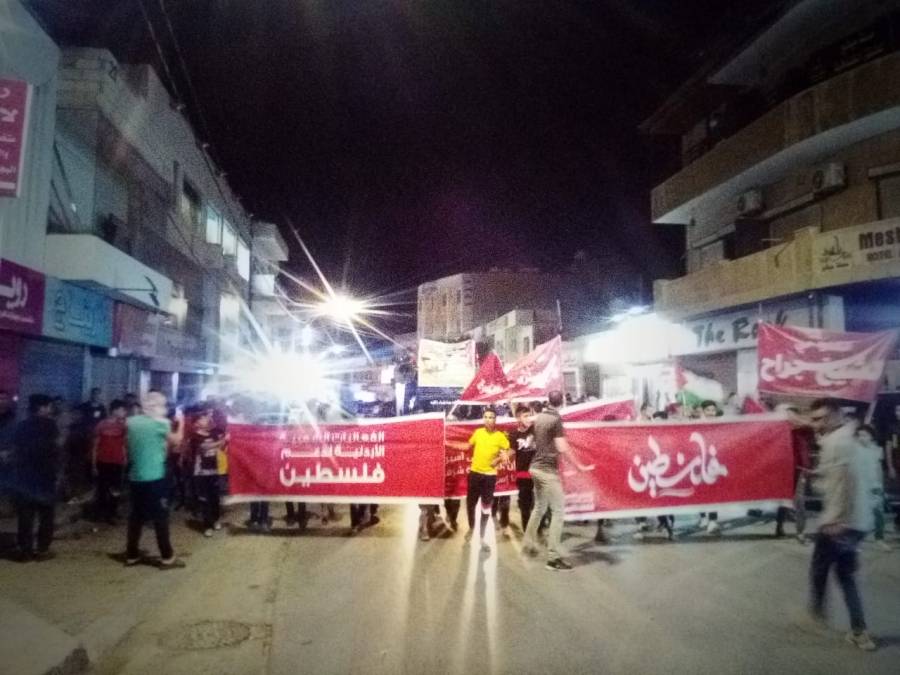 تنظيم وقفة تضامنية في مخيم مادبا لدعم الأشقاء الفلسطينيين .. صور