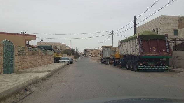 “الأمن”: غرامة مالية على مبيت شاحنات في الأحياء السكنية