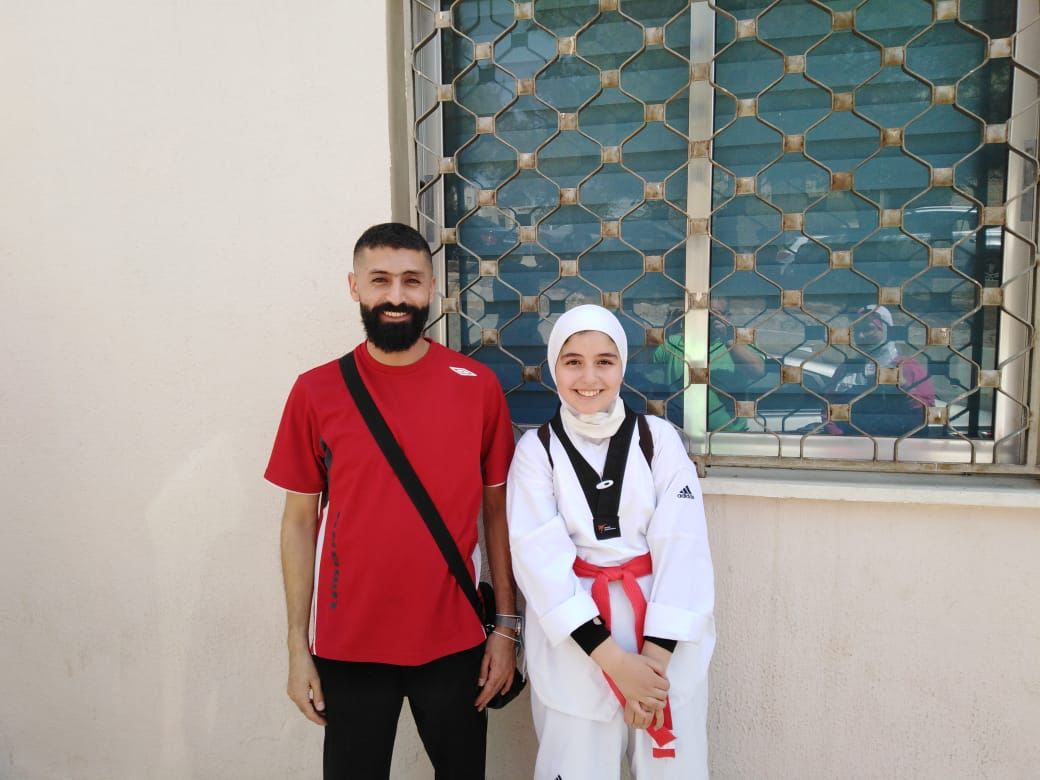 الحزام الأسود للطالبة إيمان الفراهيد من مدارس النظم الحديثة