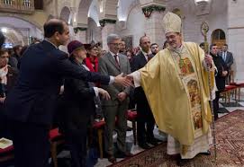 مندوبا عن الملك وزير الداخلية يحضر قداس منتصف الليل بكنيسة المهد في بيت لحم