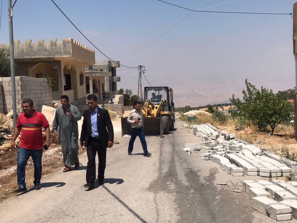 بلدية الشفا تبدأ بتنفيذ حملة على الاعتداءات على شوارع الوهادنة 