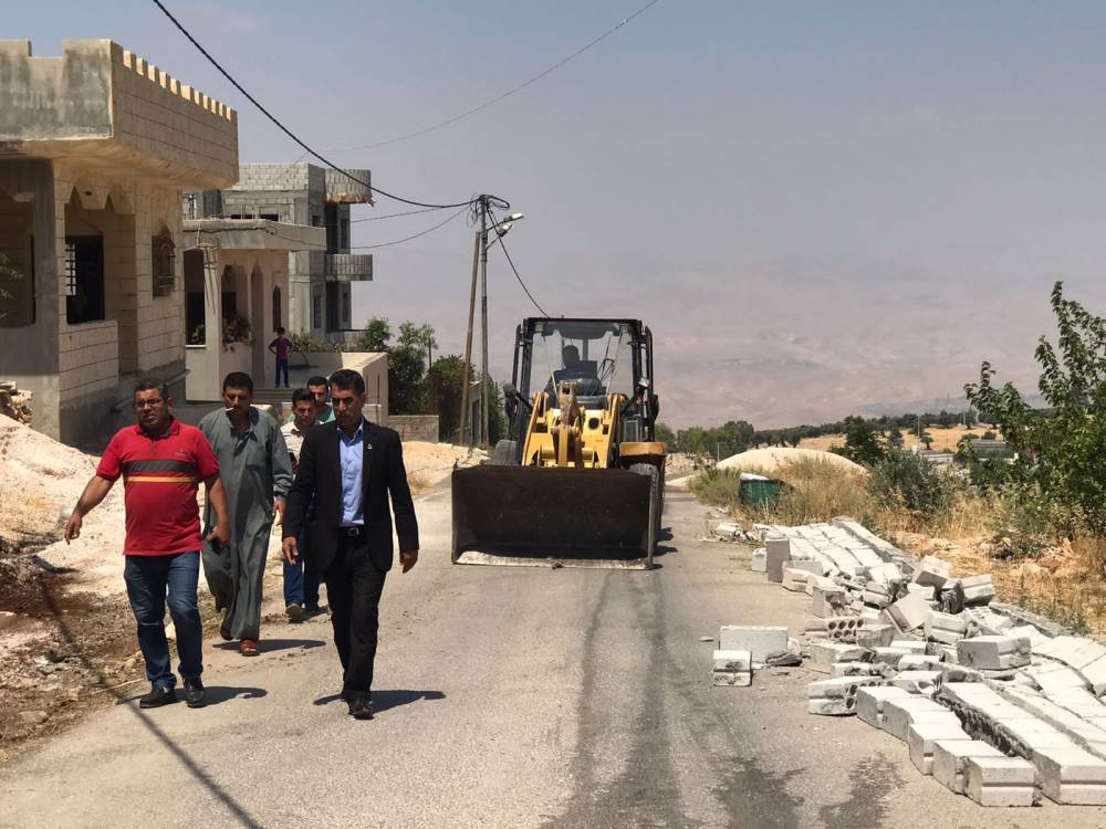 بلدية الشفا تبدأ بتنفيذ حملة على الاعتداءات على شوارع الوهادنة 