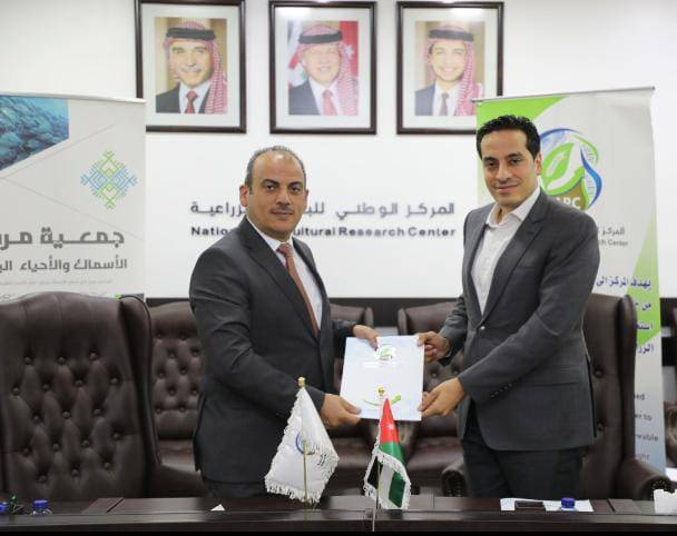 مذكرة تفاهم بين البحوث الزراعية وجمعية مربي الأسماك
