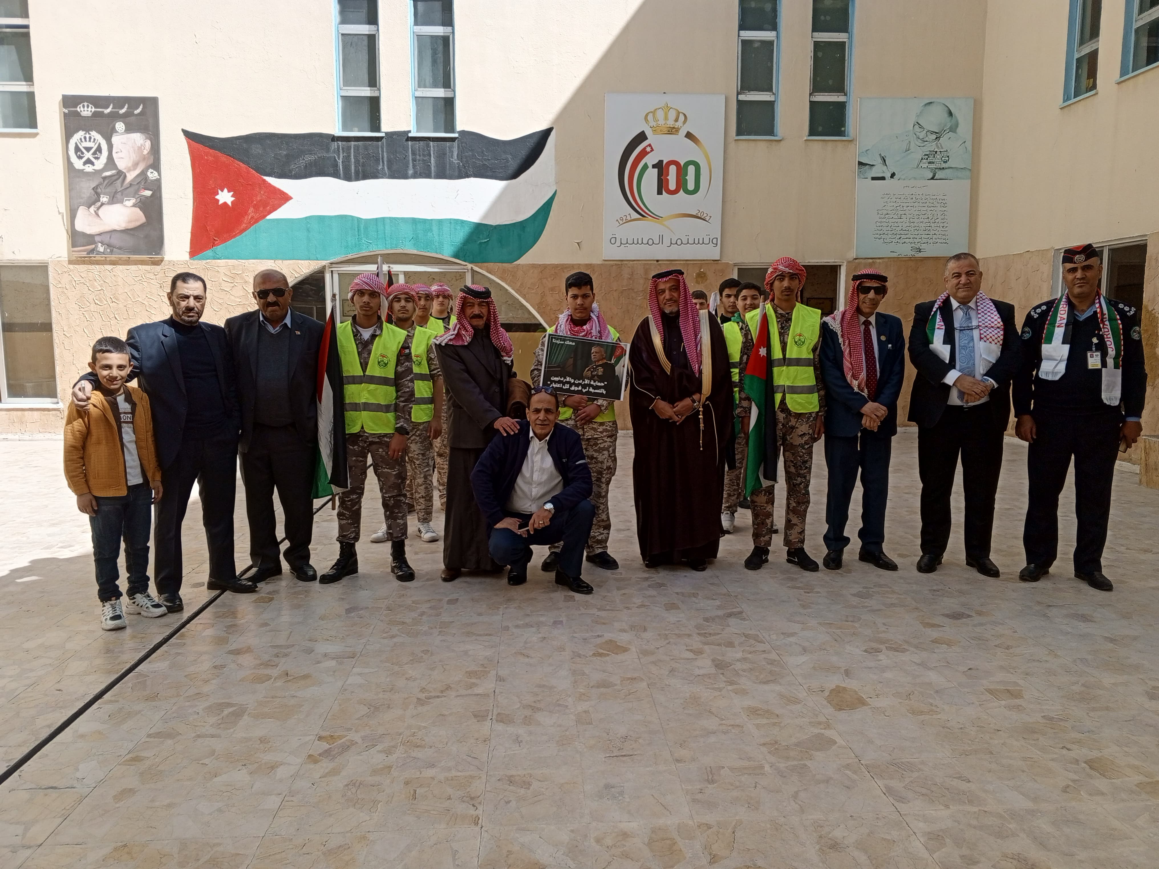 الشرطة المجتمعية والمجلس المحلي لمركز أمن المهاجرين المتكامل يحتفل بيوم العلم 