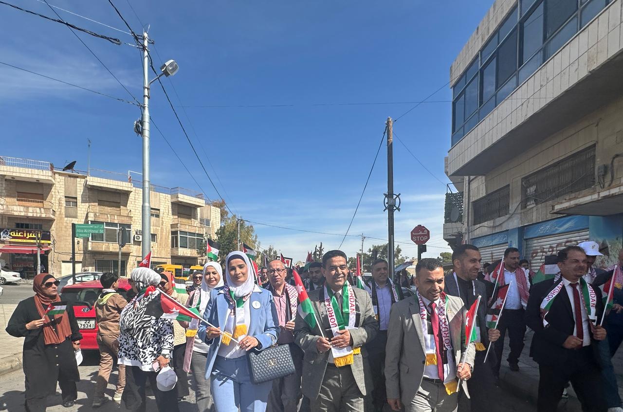 . أسرة تربية لواء ماركا تحتفل بيوم العلم 