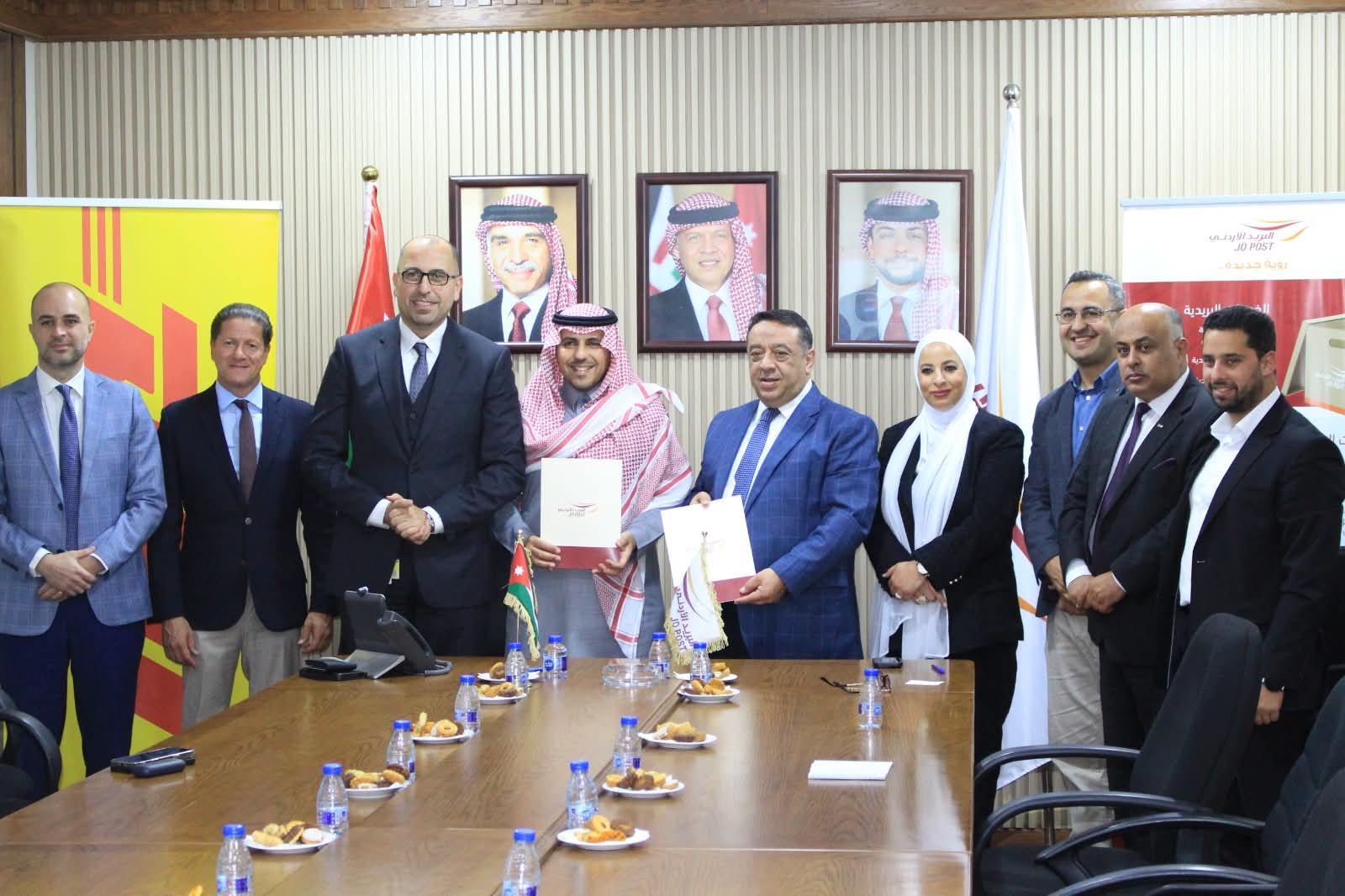 اتفاقية منحة تمويلية بين البريد الأردني وشركةدي إتش إل إكسبرس لتدريب ١٠٠شاب وشابة.