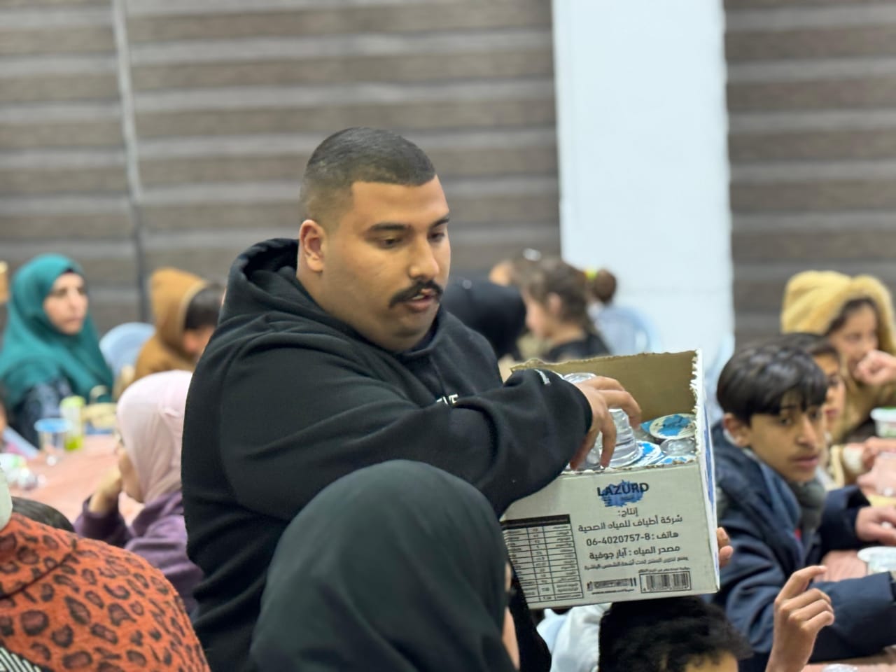 كلنا الاردن تقيم افطارا للأيتام في مادبا